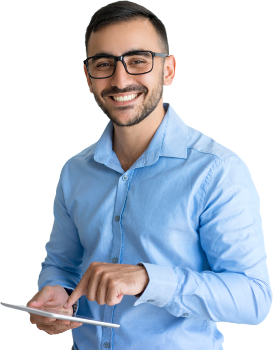 Portrait of a mature businessman standing in an office smiling pointing at an ipad  facing the camera